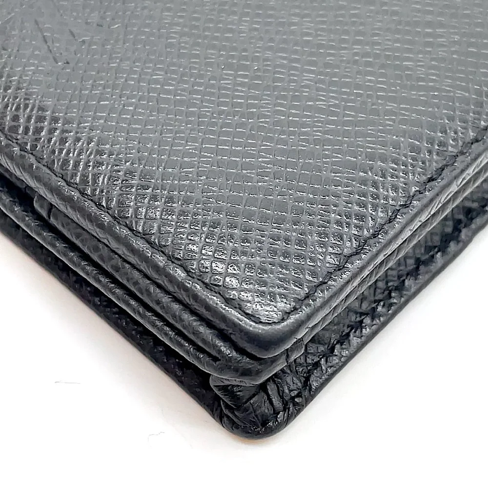 LOUIS VUITTON Black Taiga Porte Monnaie Boite COMES WITH: LV BOX, DUST BAG